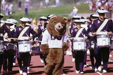 UNC Mascot walking with marching band